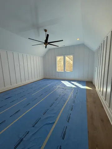 a living room with a couch and a fireplace