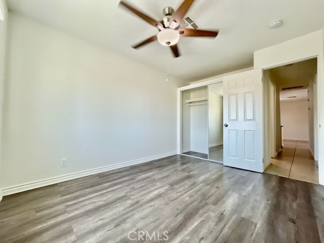 79380 Ave 42, Unit 2 Bermuda Dunes, CA 92203 - Photo 13 of 15 wooden floor in an empty room