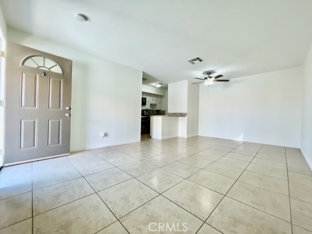 79380 Ave 42, Unit 2 Bermuda Dunes, CA 92203 - Photo 3 of 15 a view of a kitchen with a sink and cabinets