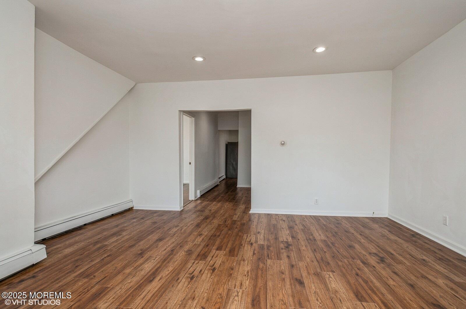 118 Joline Avenue, Unit 1 Long Branch, NJ 07740 - Photo 7 of 21 a view of a room with wooden floor