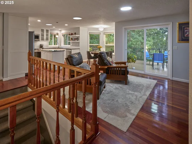 a view of dining room with furniture window and wooden floor