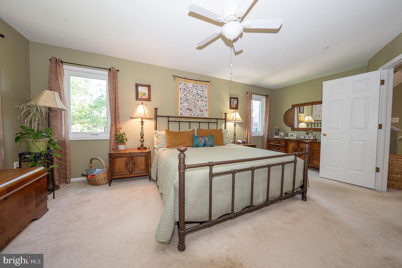 224 Fox Run Exton, PA 19341 - Photo 19 of 40 a bed room with a bed and a chair