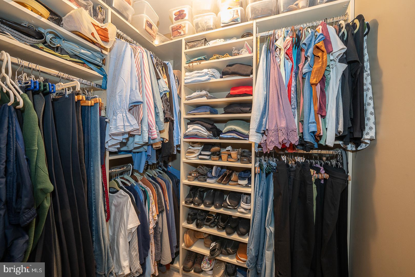224 Fox Run Exton, PA 19341 - Photo 24 of 40 a view of walk in closet with clothes and shoes