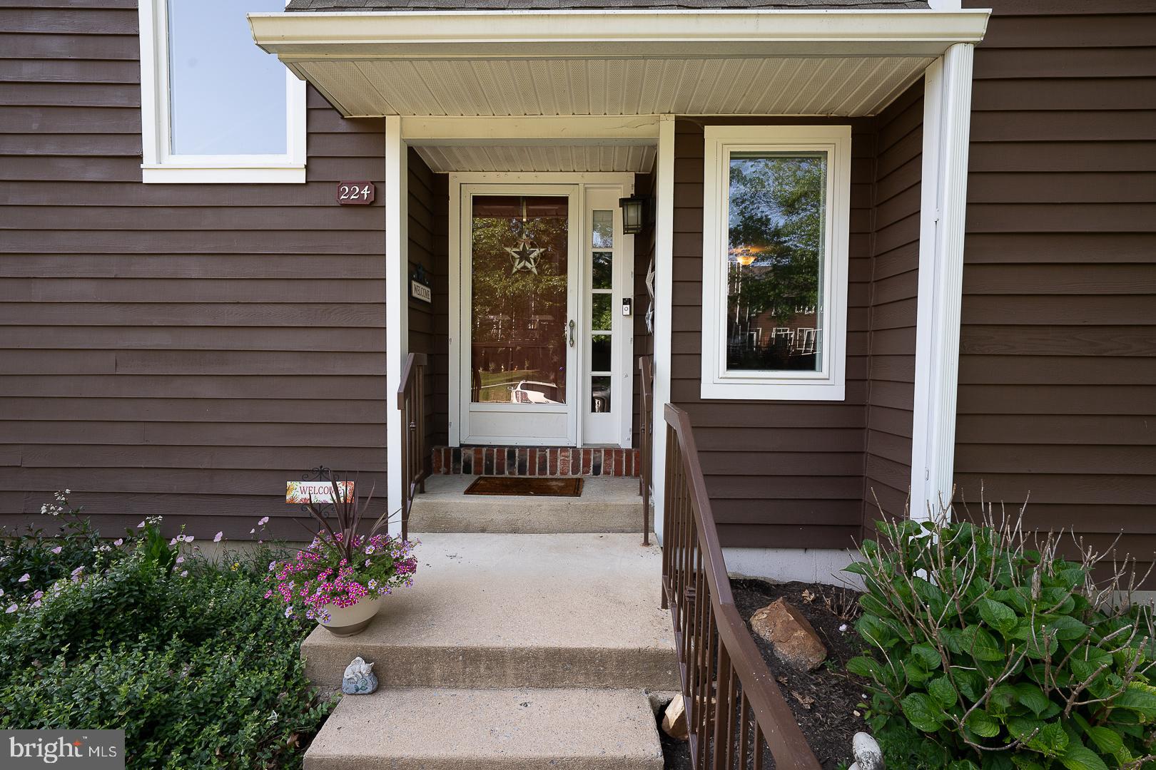 224 Fox Run Exton, PA 19341 - Photo 3 of 40 a front view of a house with a garden