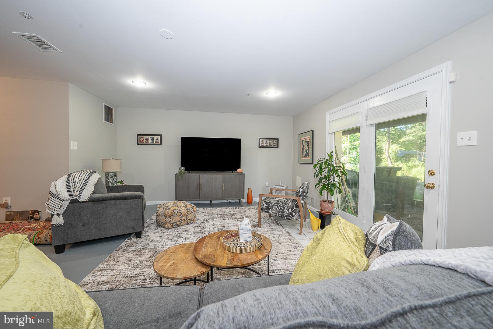 224 Fox Run Exton, PA 19341 - Photo 32 of 40 a living room with furniture and a flat screen tv