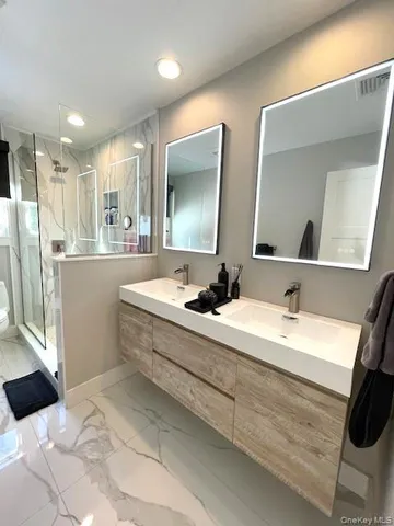 a bedroom with bed and window