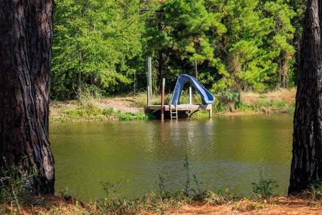 a view of outdoor space and covered with trees
