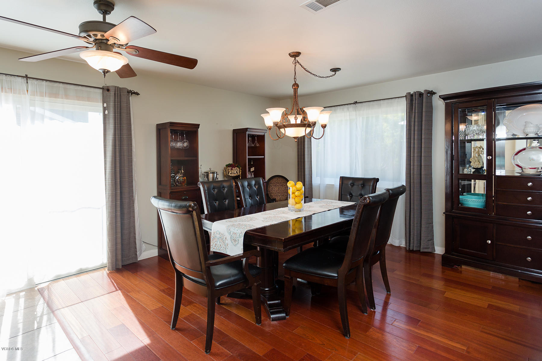 648 Appleton Road Simi Valley, CA 93065 - Photo 16 of 42 a view of a dining room with furniture window and wooden floor