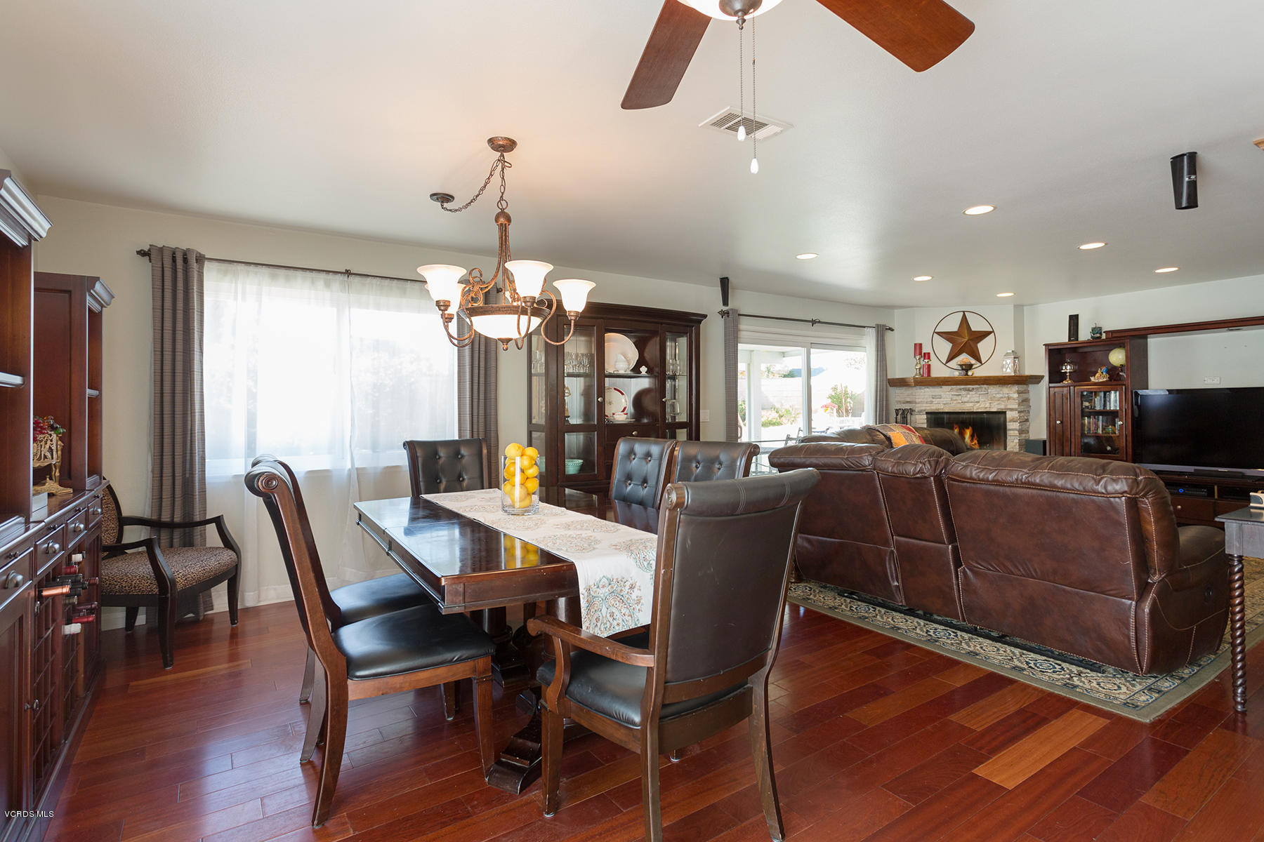 648 Appleton Road Simi Valley, CA 93065 - Photo 17 of 42 a view of a dining room with furniture window and wooden floor