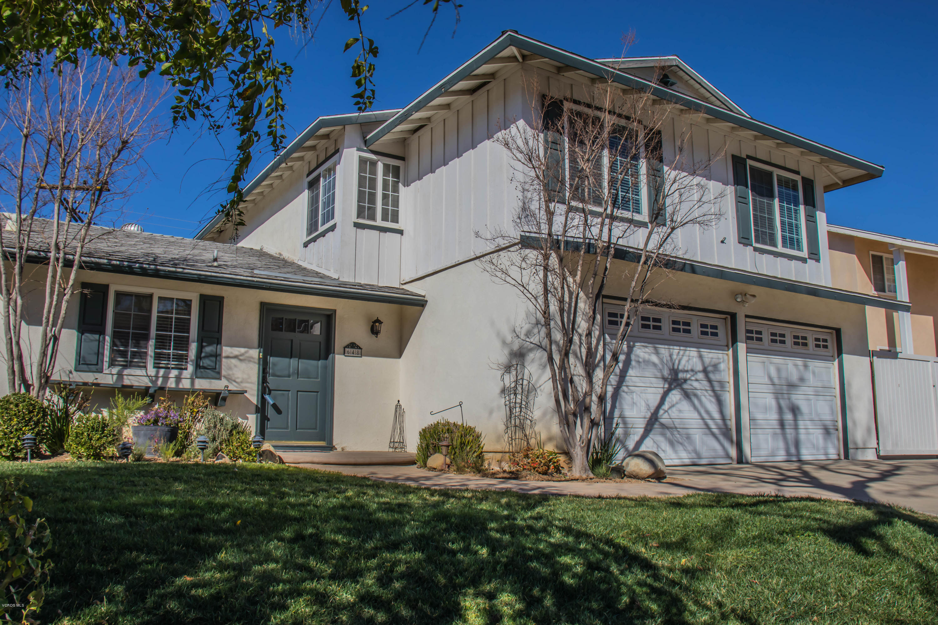 648 Appleton Road Simi Valley, CA 93065 - Photo 3 of 42 a front view of a house with garden