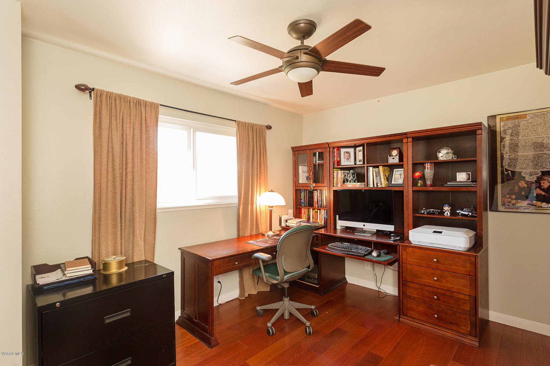 648 Appleton Road Simi Valley, CA 93065 - Photo 25 of 42 a view of a workspace with furniture and a window