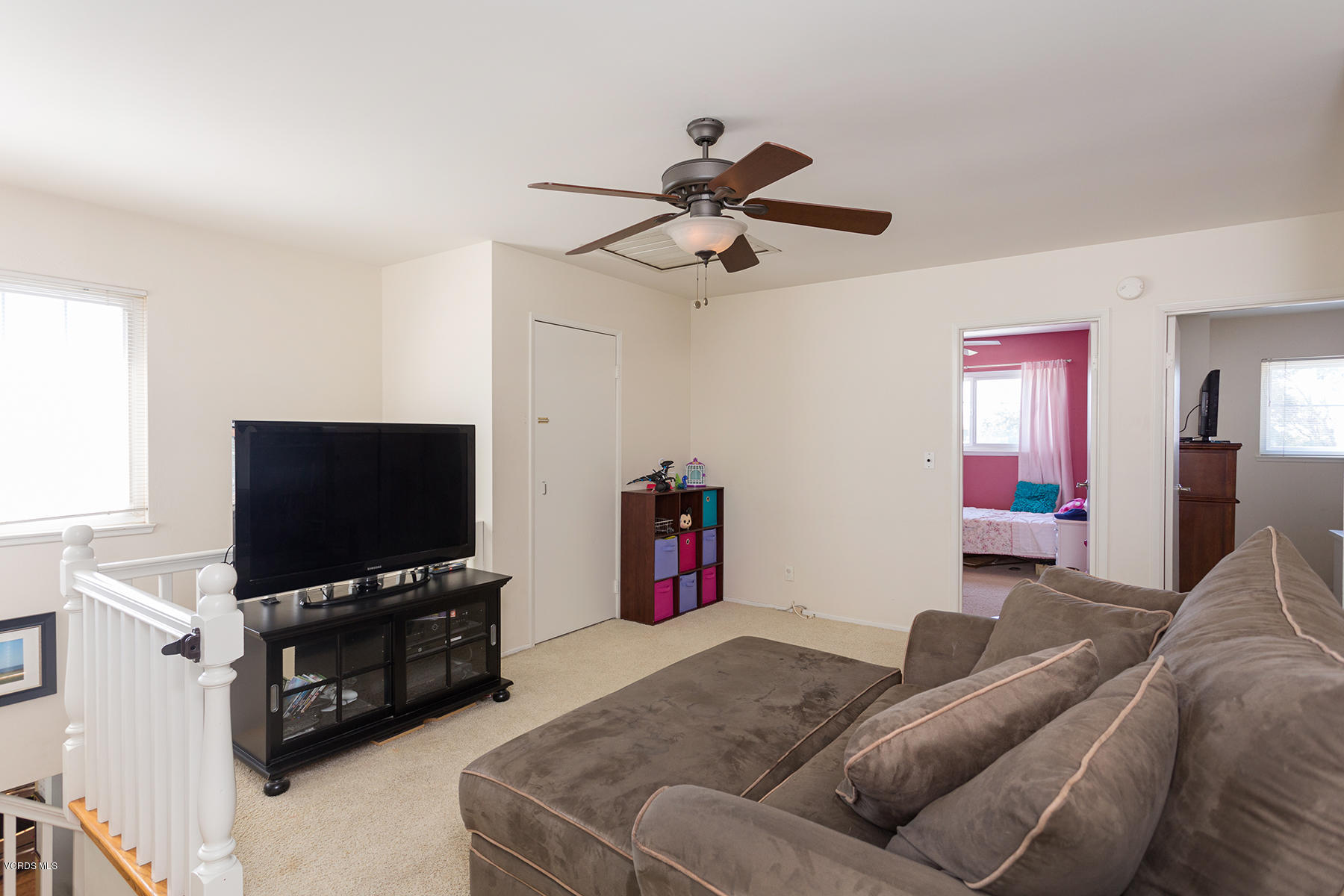 648 Appleton Road Simi Valley, CA 93065 - Photo 27 of 42 a living room with furniture and a flat screen tv
