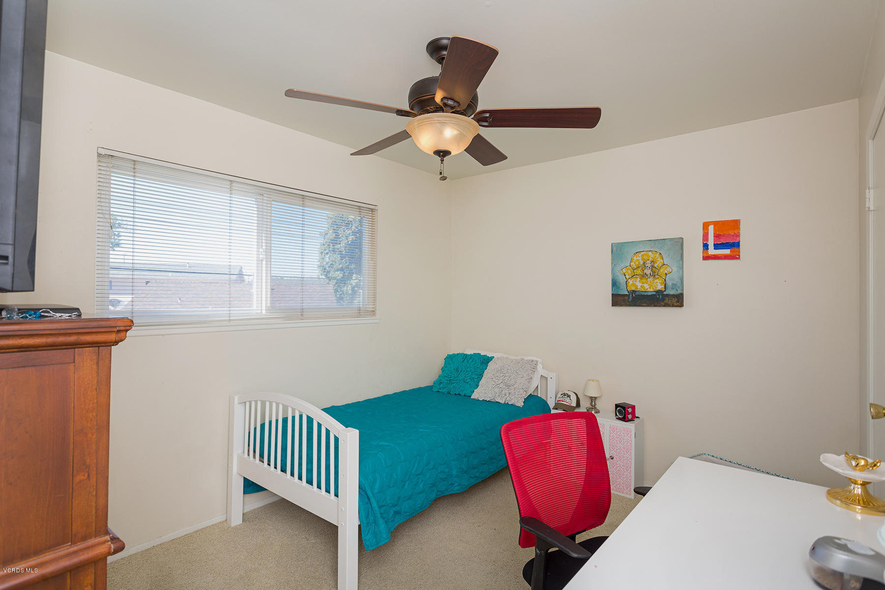 648 Appleton Road Simi Valley, CA 93065 - Photo 30 of 42 a bedroom with a bed and a couch