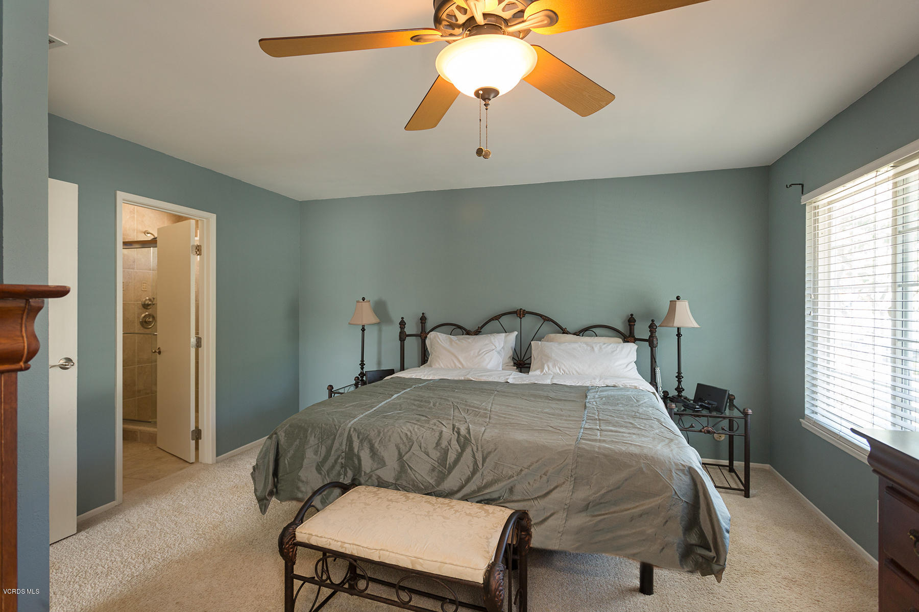 648 Appleton Road Simi Valley, CA 93065 - Photo 31 of 42 a bedroom with a bed and a chandelier