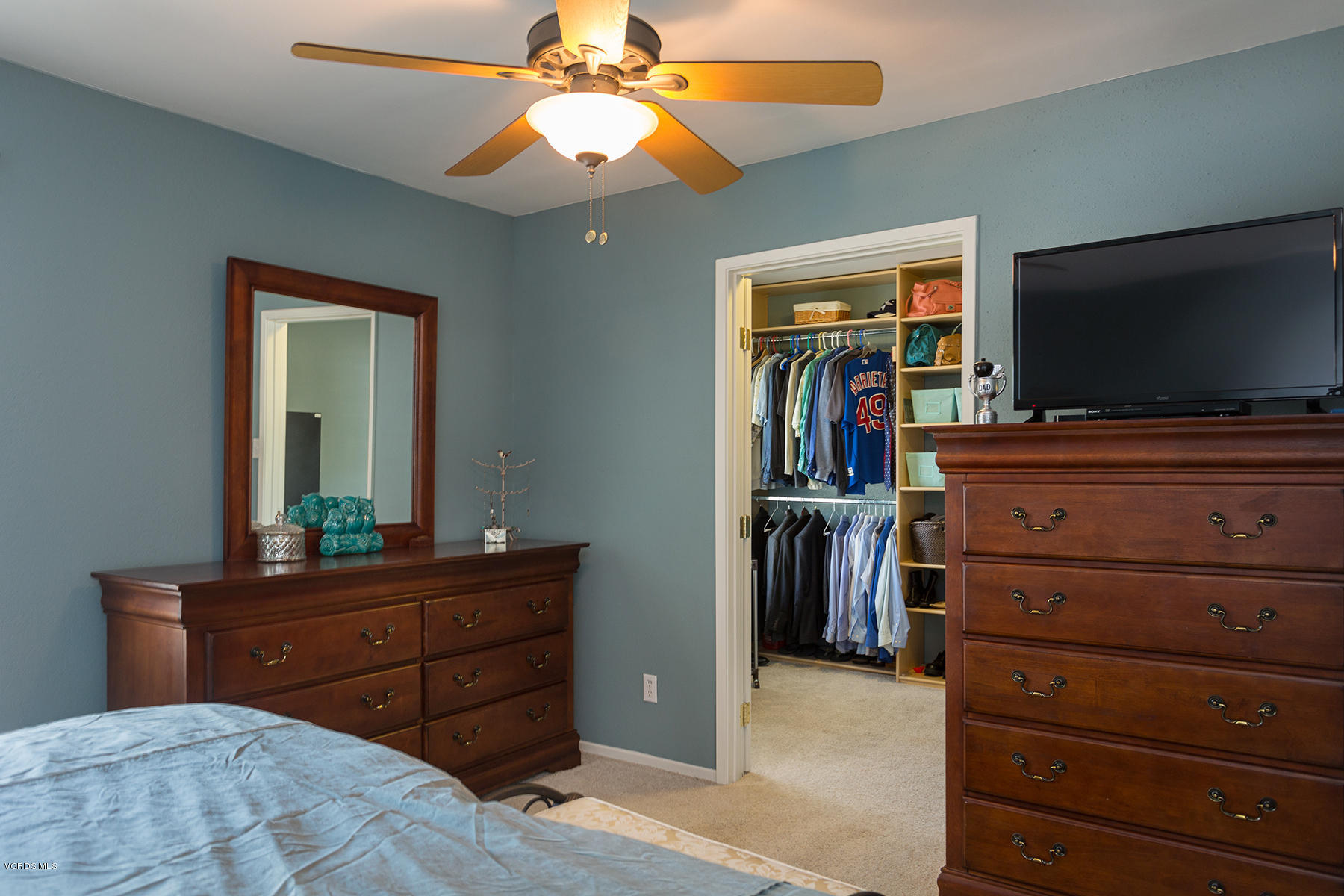 648 Appleton Road Simi Valley, CA 93065 - Photo 33 of 42 a room with a bed and a flat screen tv