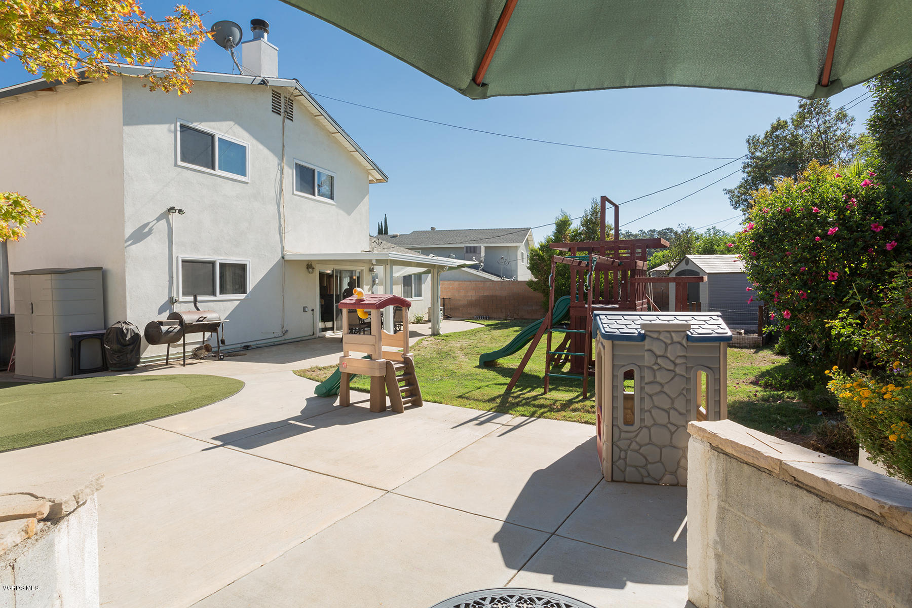 648 Appleton Road Simi Valley, CA 93065 - Photo 42 of 42 a view of a patio with table and chairs potted plants