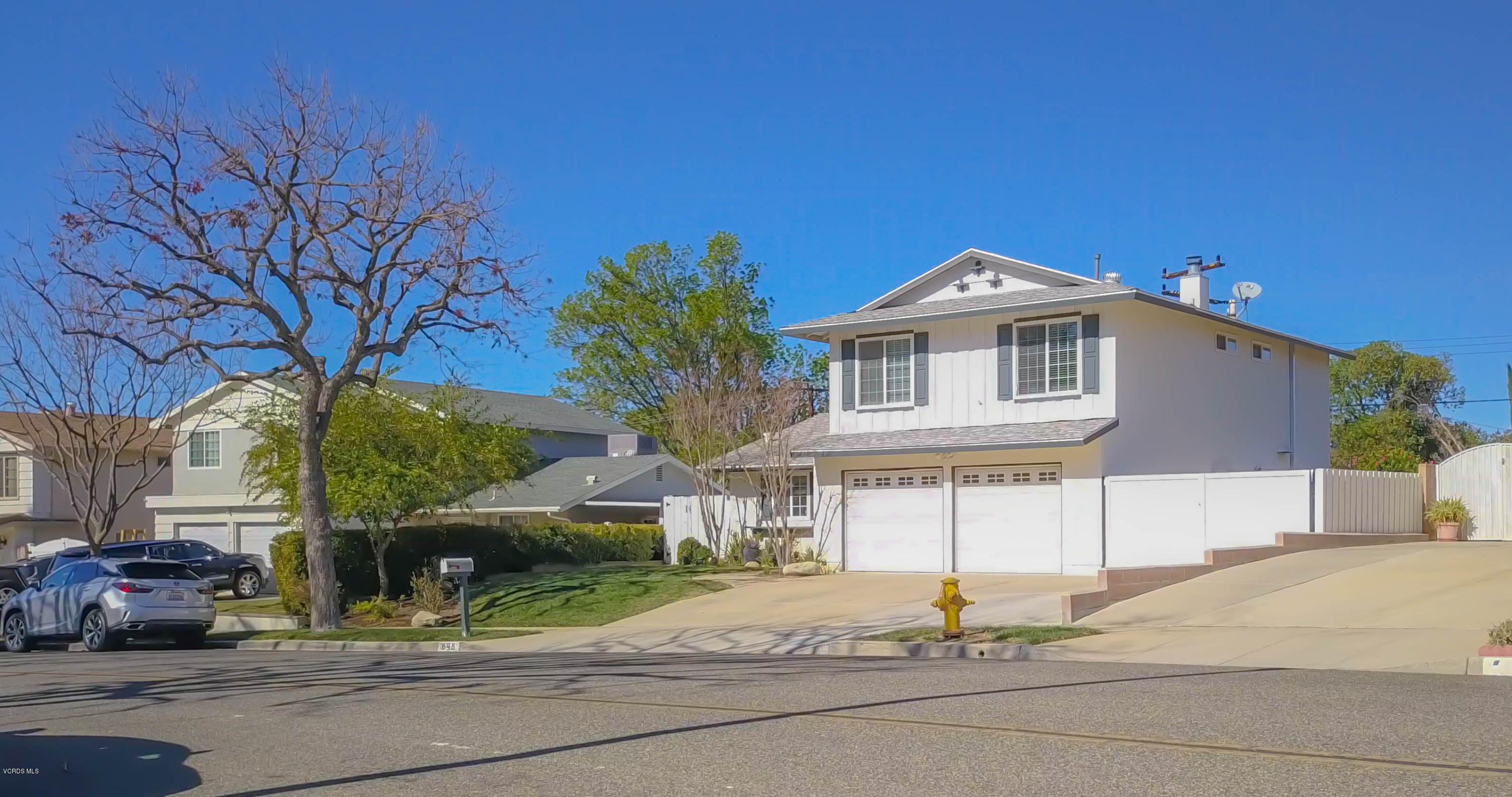 648 Appleton Road Simi Valley, CA 93065 - Photo 7 of 42 a front view of a house with a yard