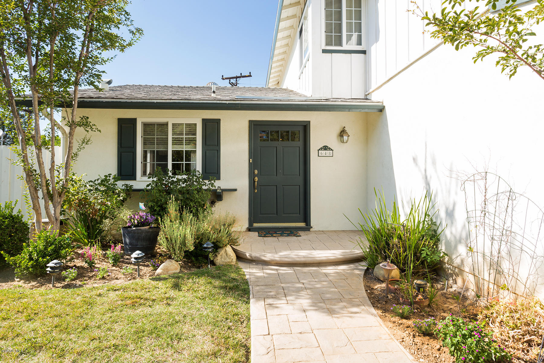 648 Appleton Road Simi Valley, CA 93065 - Photo 8 of 42 a view of a house with potted plants