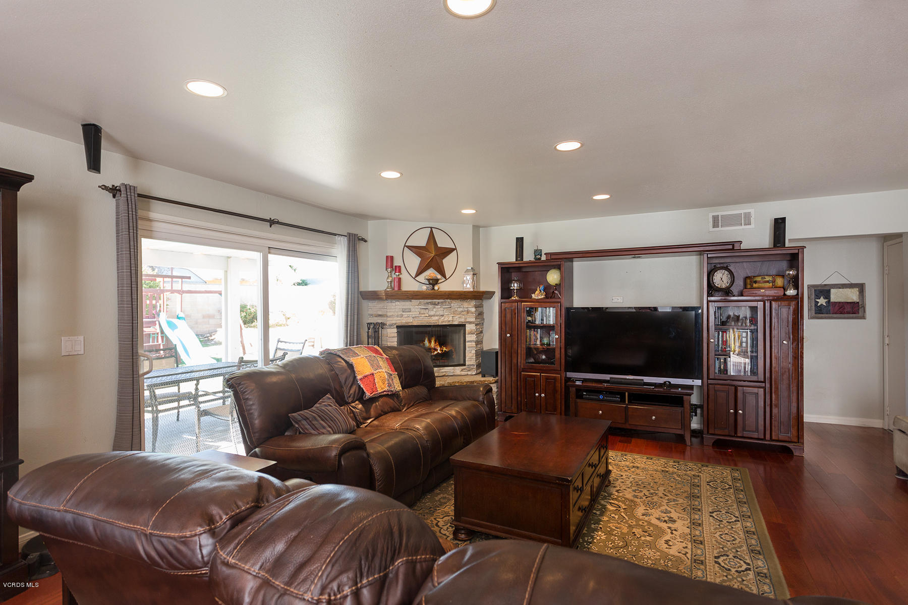 648 Appleton Road Simi Valley, CA 93065 - Photo 10 of 42 a living room with furniture and a flat screen tv