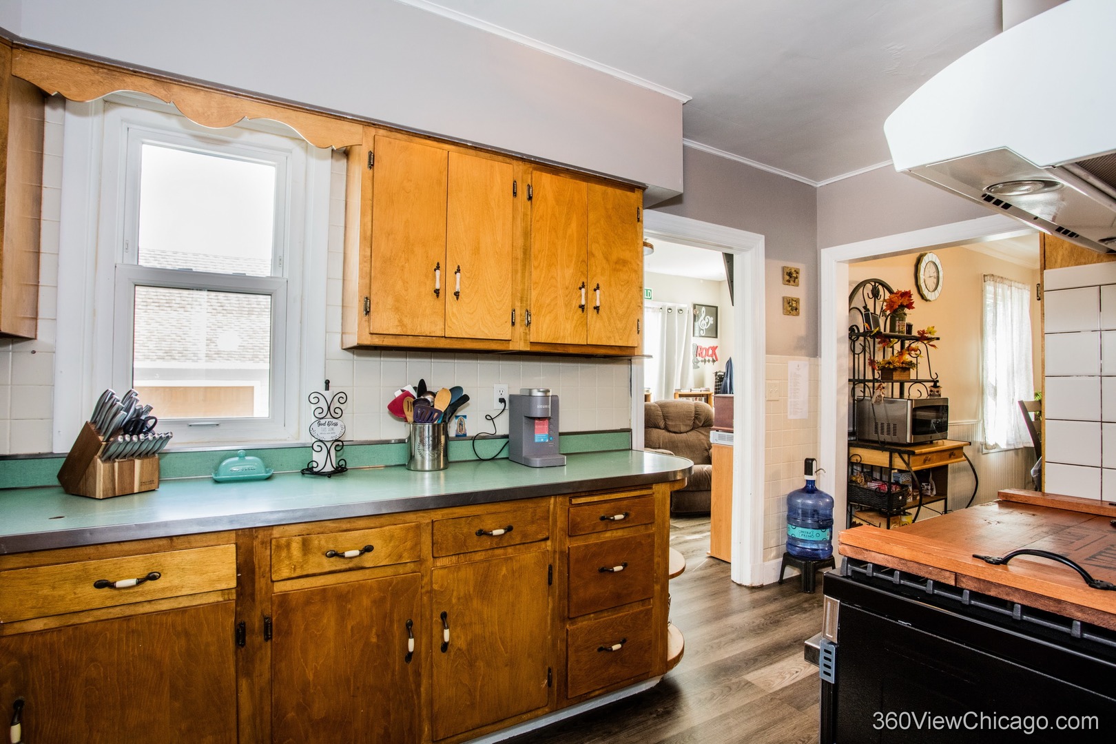 6308 Main Street Union, IL 60180 - Photo 12 of 39 a kitchen with stainless steel appliances granite countertop a stove and a sink