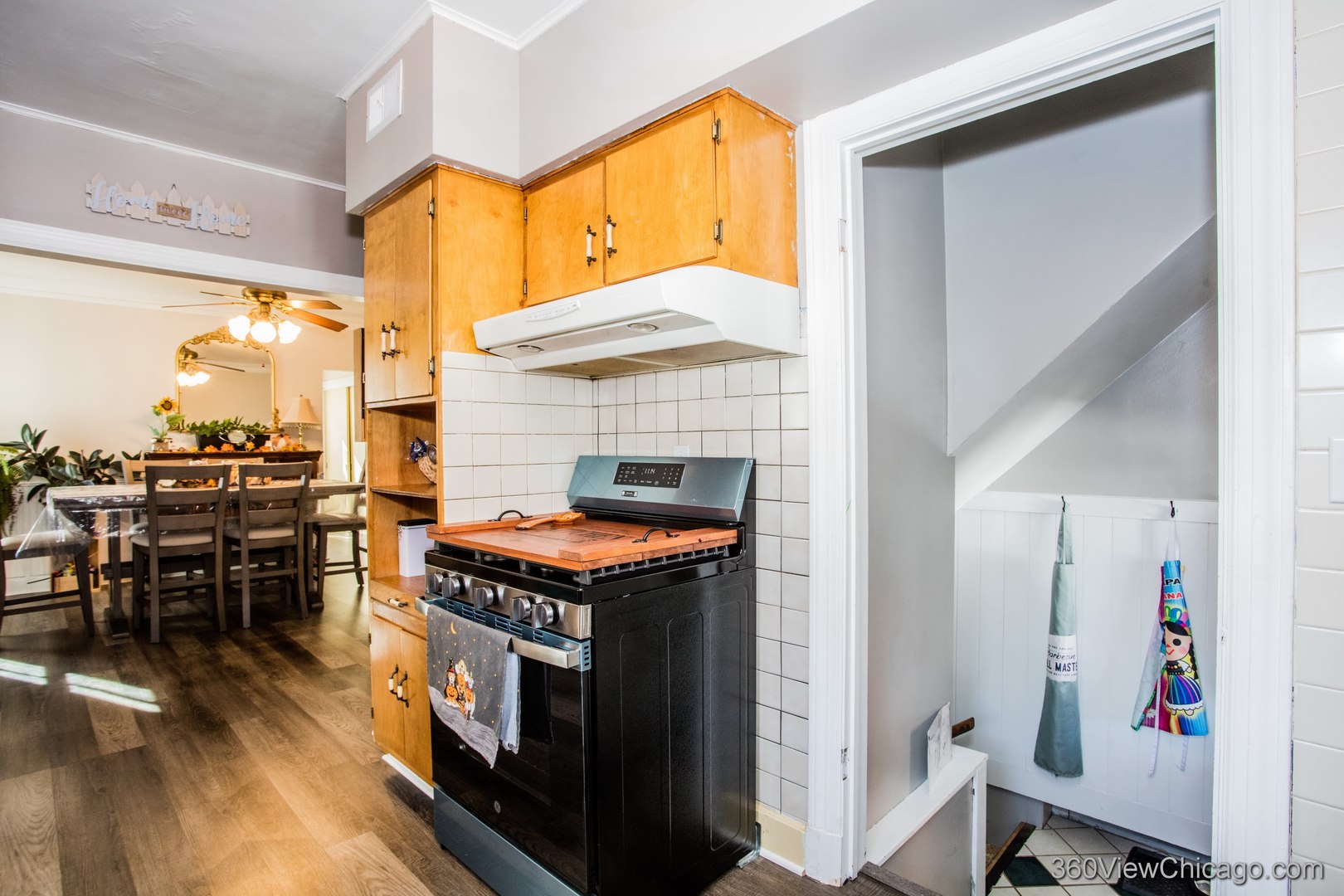 6308 Main Street Union, IL 60180 - Photo 14 of 39 a kitchen with a stove and a refrigerator