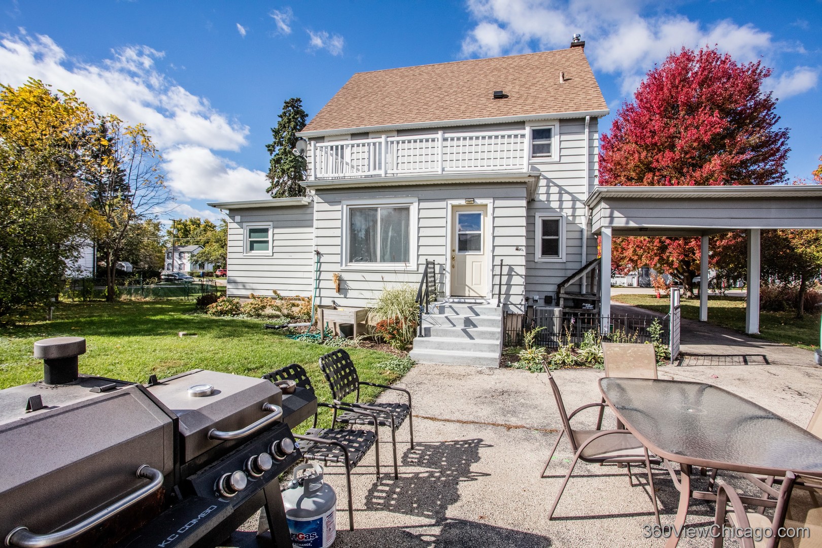 6308 Main Street Union, IL 60180 - Photo 38 of 39 a view of a house with backyard porch and sitting area