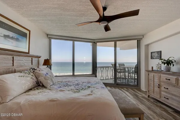 a bathroom with a sink vanity toilet and shower