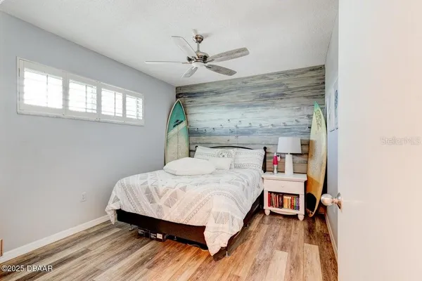 a large kitchen with stainless steel appliances granite countertop a refrigerator and a stove