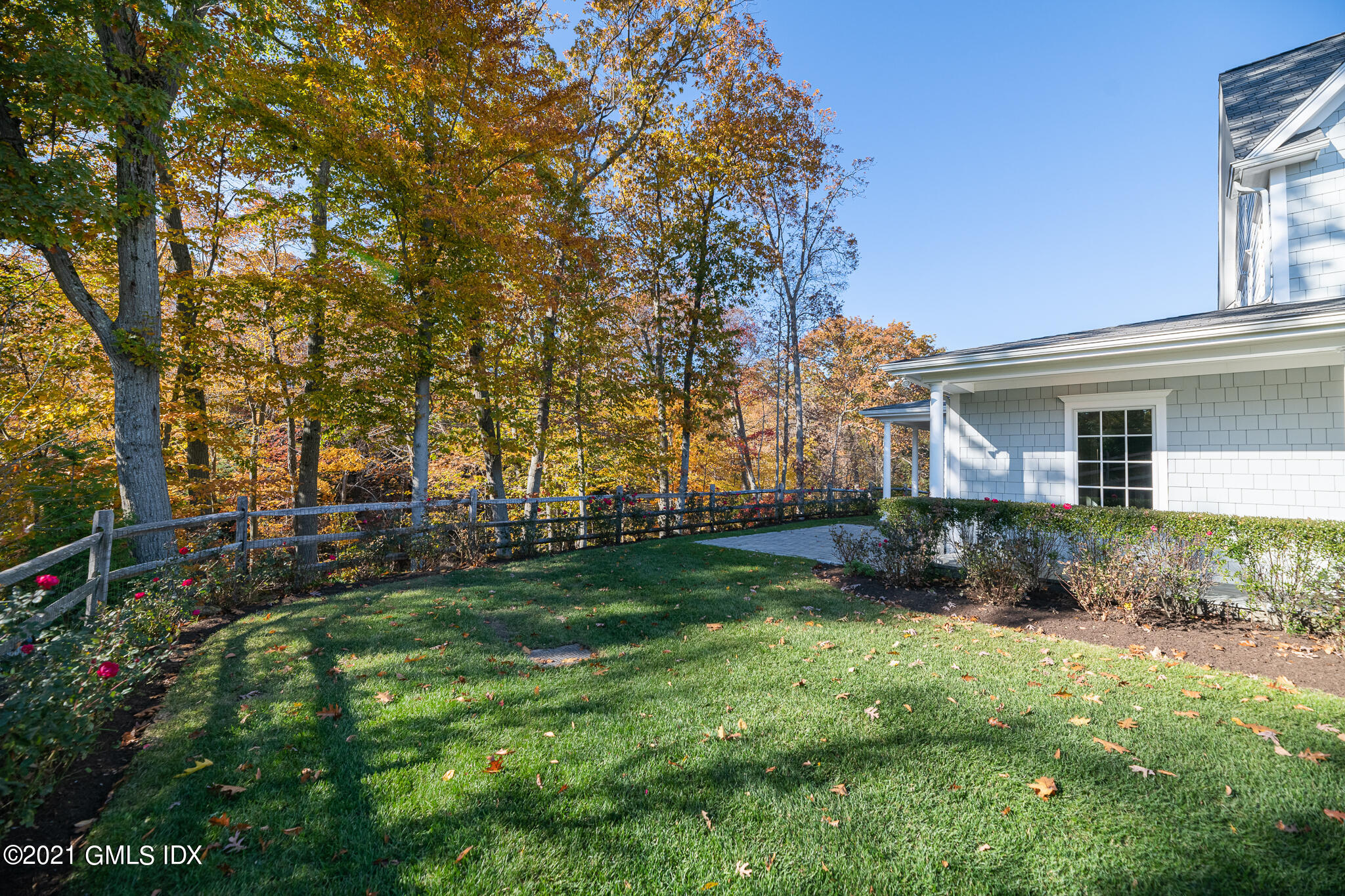 550 River Road Cos Cob, CT 06807 - Photo 27 of 33 front view of a house with a yard