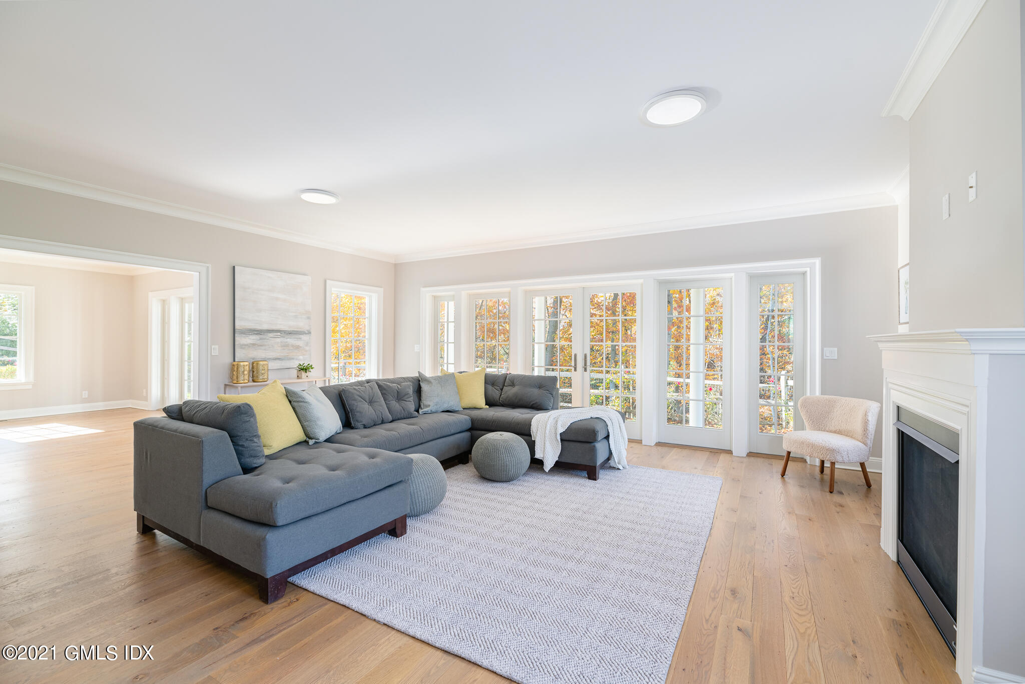550 River Road Cos Cob, CT 06807 - Photo 3 of 33 a living room with furniture and a fireplace