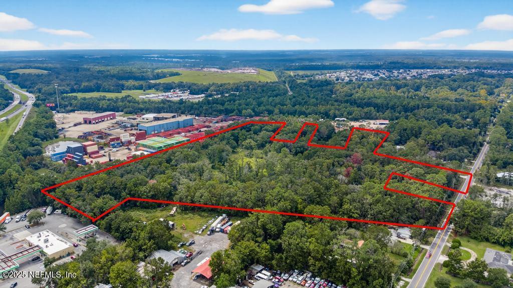 9032 New Kings Road Jacksonville, FL 32219 - Photo 7 of 23 an aerial view of a houses and city view