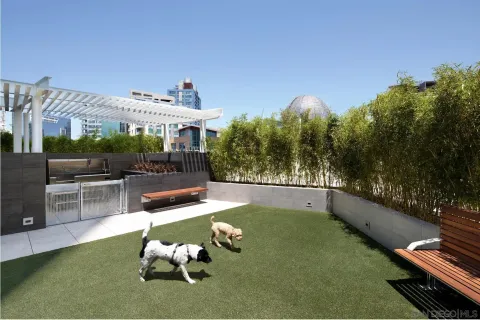 a view of a chairs and table in the patio