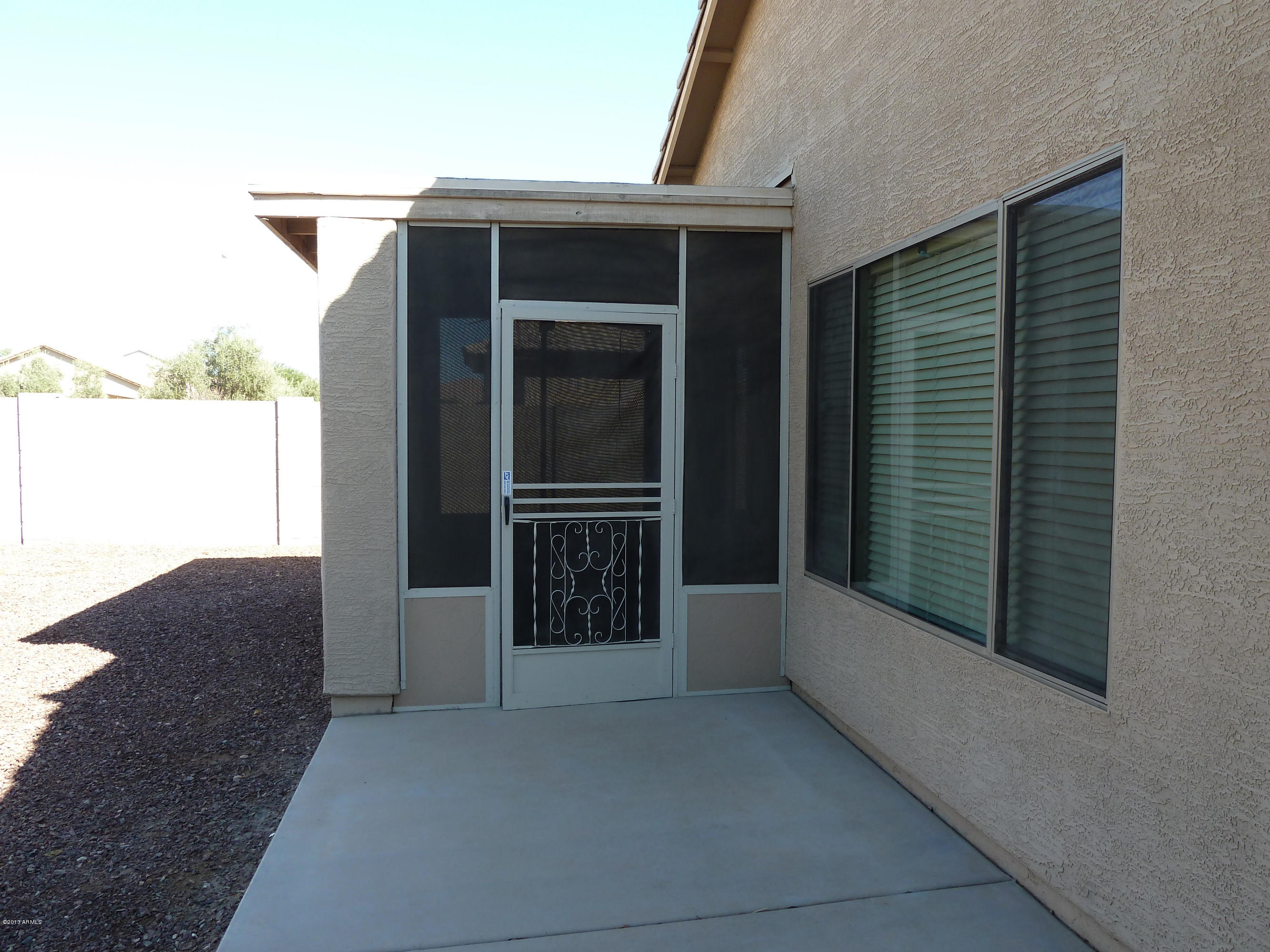 9938 West Heber Road Tolleson, AZ 85353 - Photo 16 of 17 Screened-in back patio