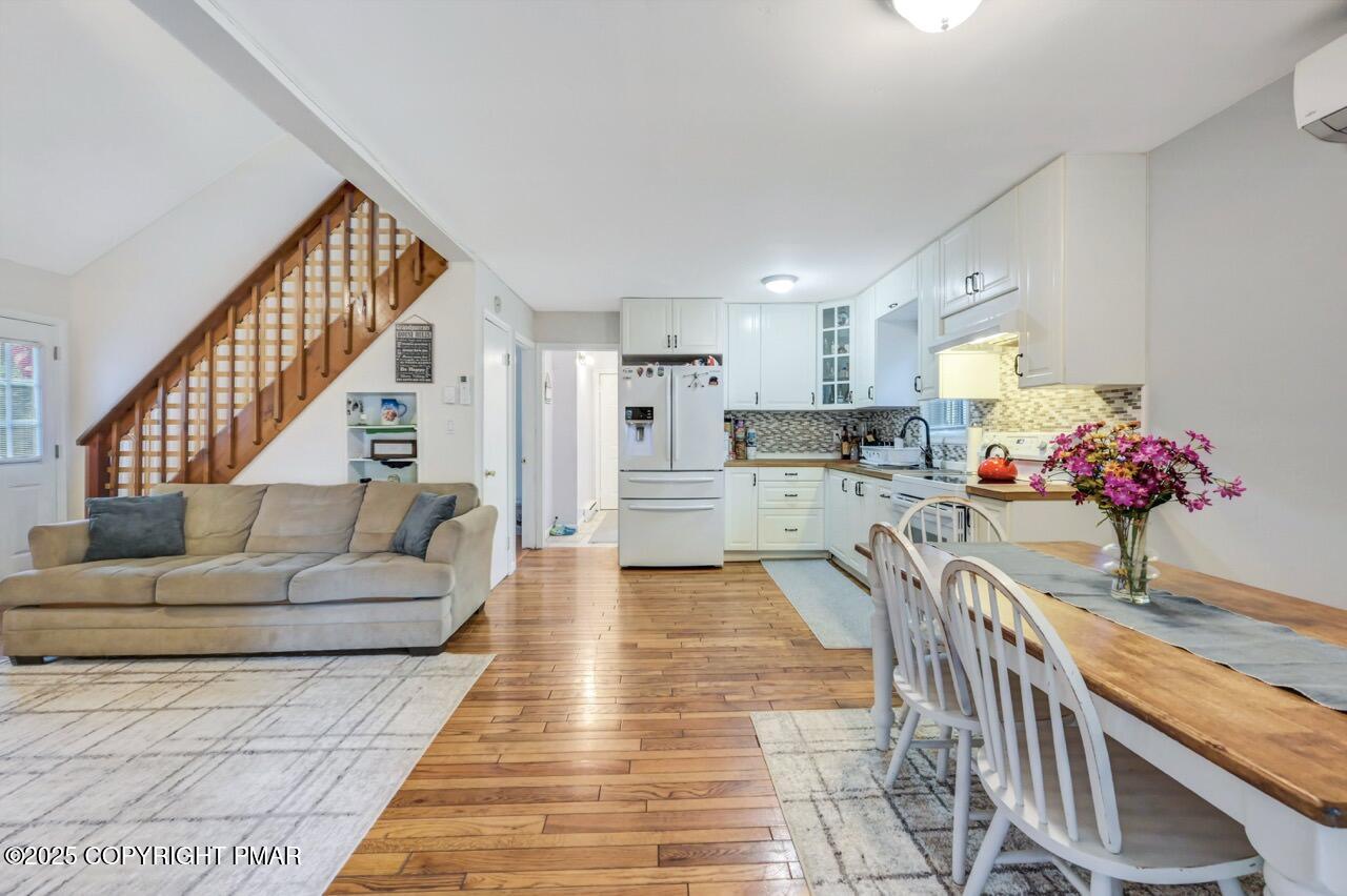 53 Barren Road East Stroudsburg, PA 18302 - Photo 12 of 39 a living room with furniture and flowers