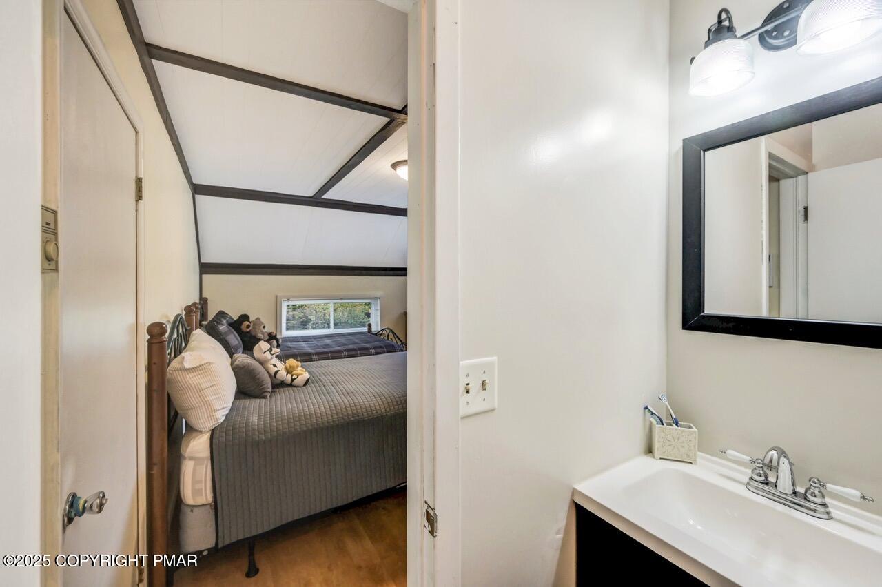 53 Barren Road East Stroudsburg, PA 18302 - Photo 29 of 39 a bathroom with a sink and mirror
