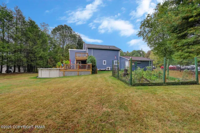 a house view with a garden space