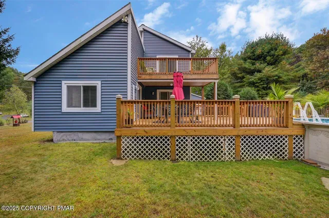 a front view of a house with a fence