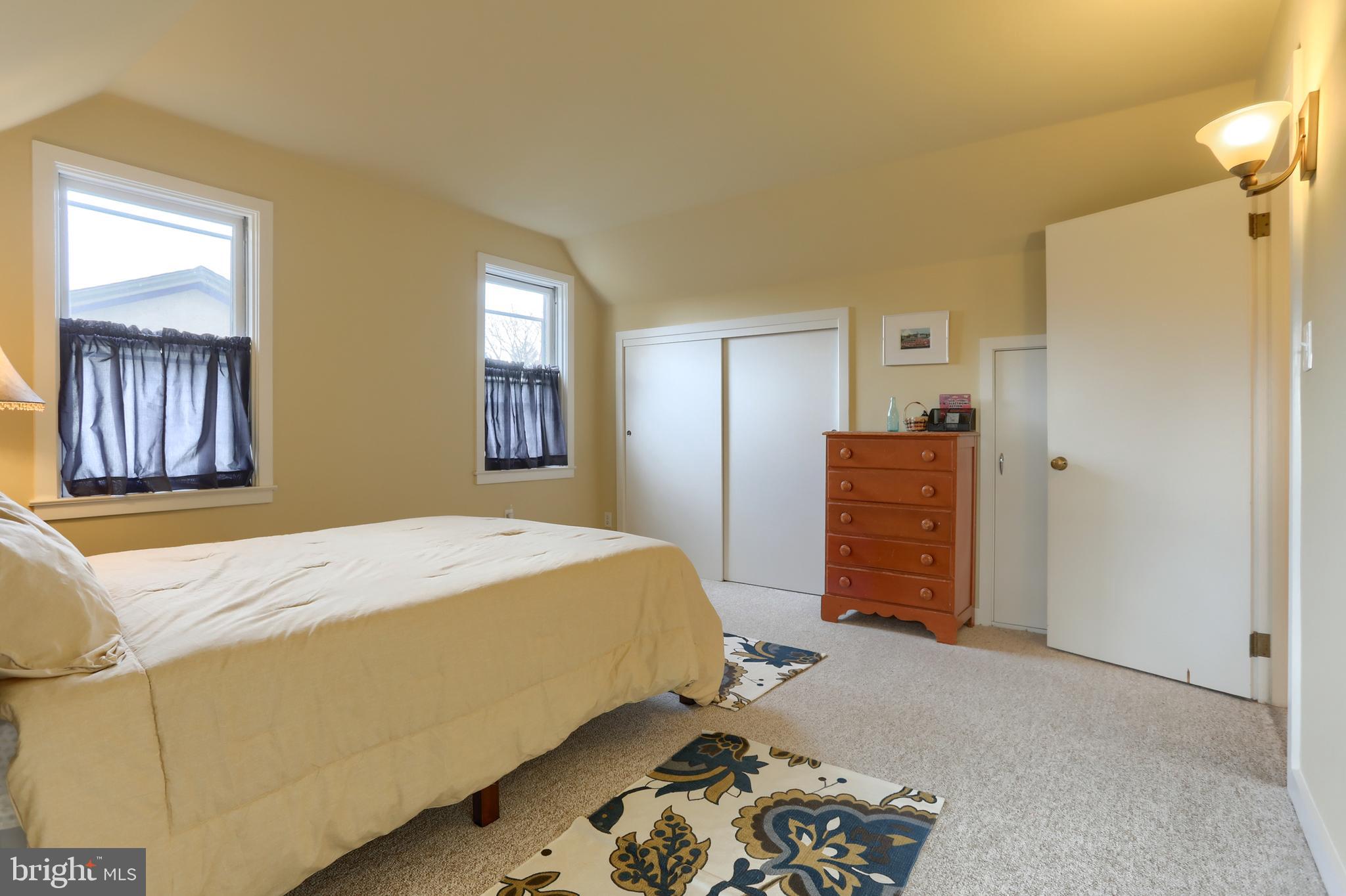3 East High Street Lebanon, PA 17042 - Photo 43 of 54 a bedroom with a bed and wooden floor