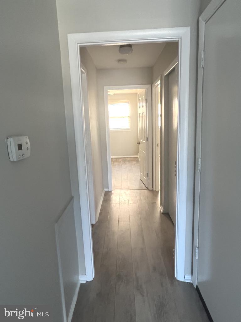 371 Avon Street, Unit 2 Philadelphia, PA 19116 - Photo 11 of 16 a view of a hallway with wooden floor