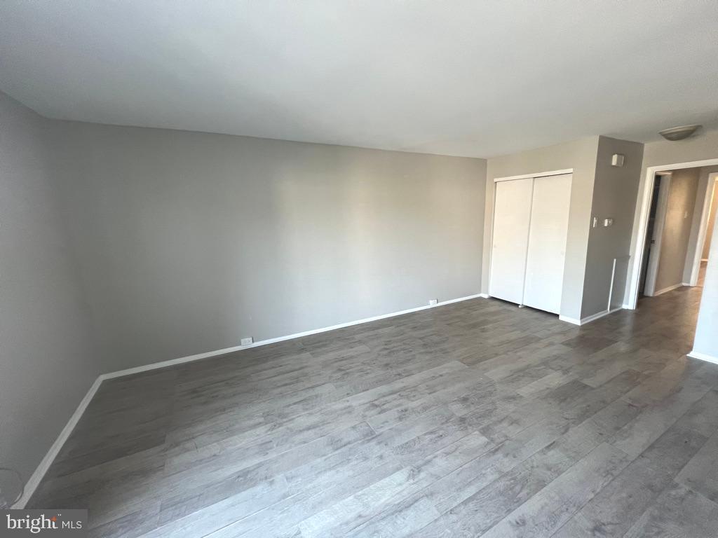 371 Avon Street, Unit 2 Philadelphia, PA 19116 - Photo 6 of 16 a view of an empty room and wooden floor