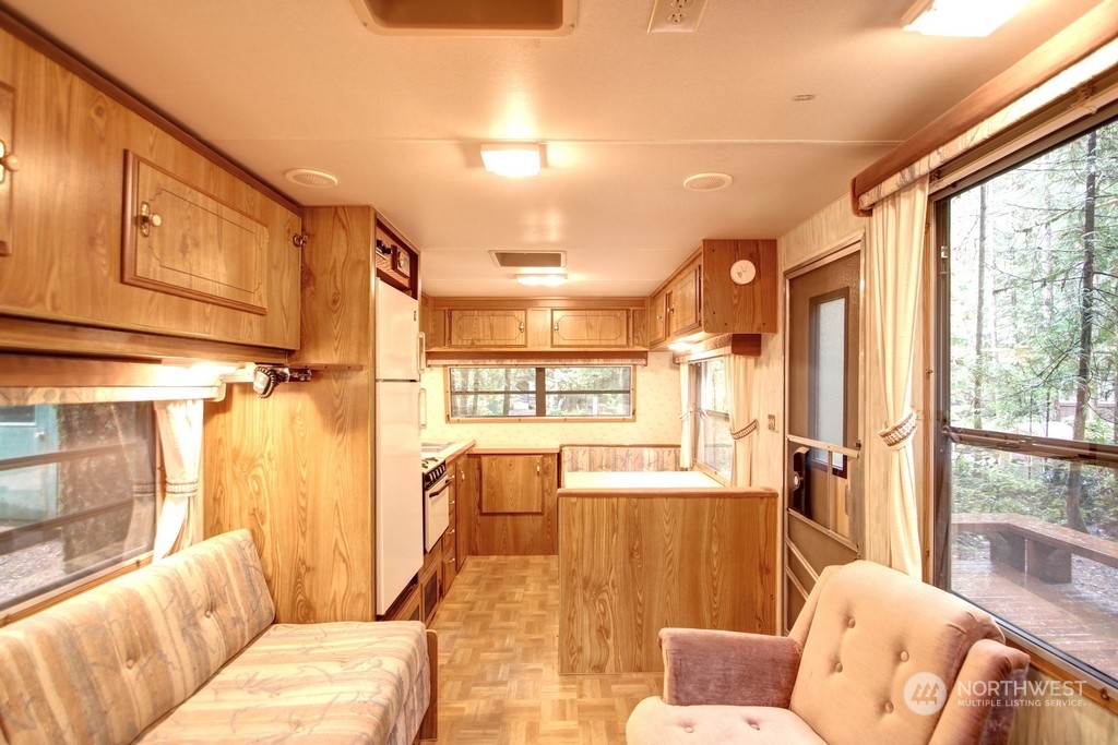 90-2 Wilderness Way Maple Falls, WA 98266 - Photo 12 of 39 a living room with furniture and a large window