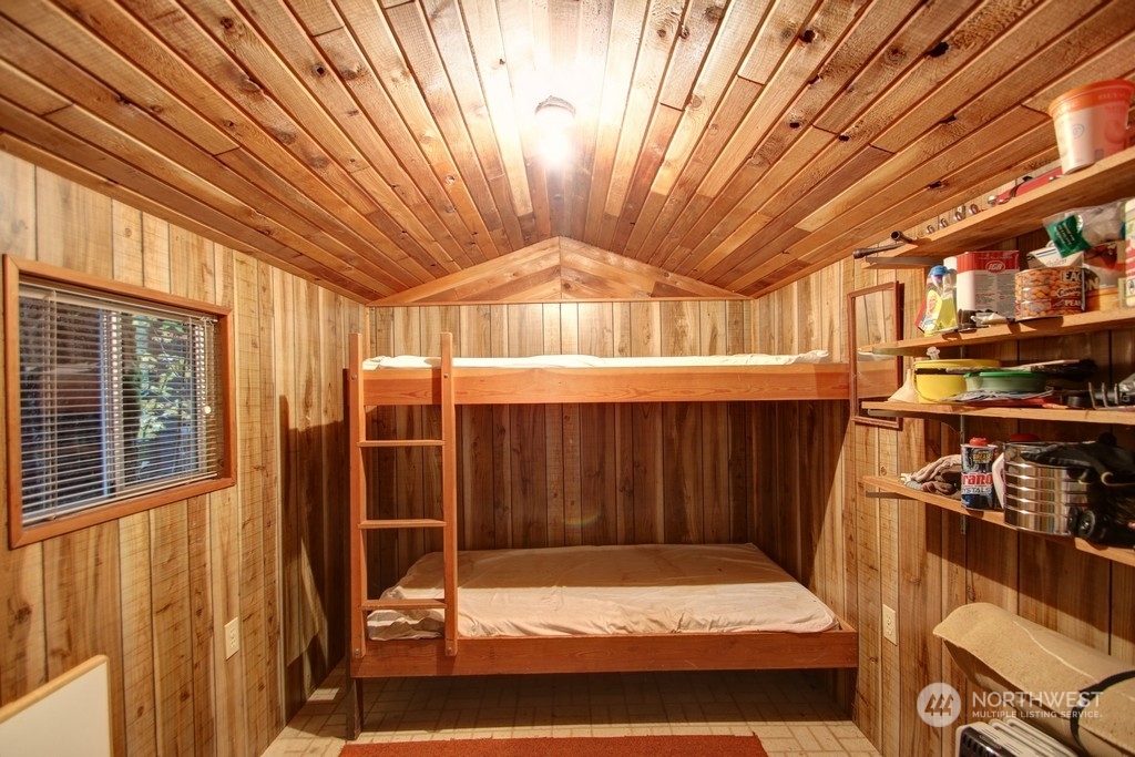 90-2 Wilderness Way Maple Falls, WA 98266 - Photo 23 of 39 a view of a porch with furniture and a backyard