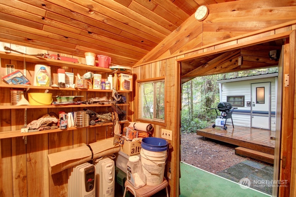 90-2 Wilderness Way Maple Falls, WA 98266 - Photo 25 of 39 a balcony with furniture and a potted plant