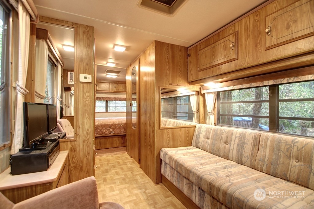 90-2 Wilderness Way Maple Falls, WA 98266 - Photo 4 of 39 a living room with furniture and a flat screen tv