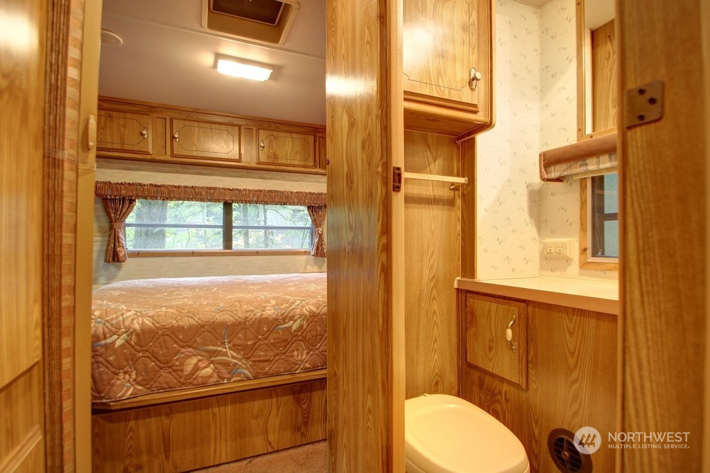 90-2 Wilderness Way Maple Falls, WA 98266 - Photo 9 of 39 a bathroom with a toilet sink and mirror