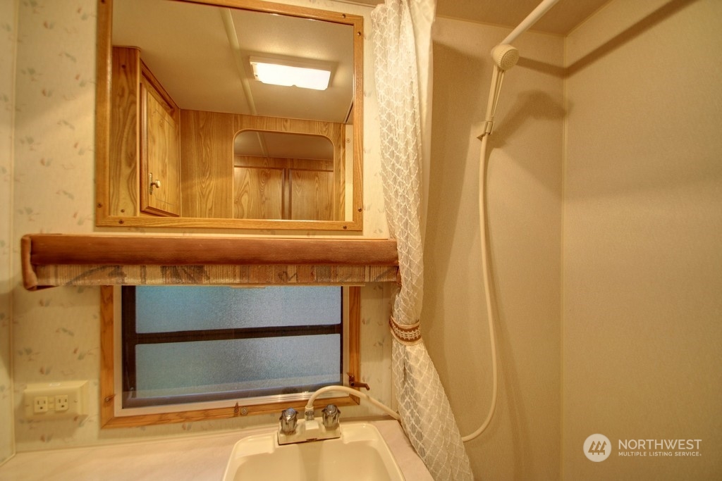 90-2 Wilderness Way Maple Falls, WA 98266 - Photo 10 of 39 a bathroom with a sink and a mirror