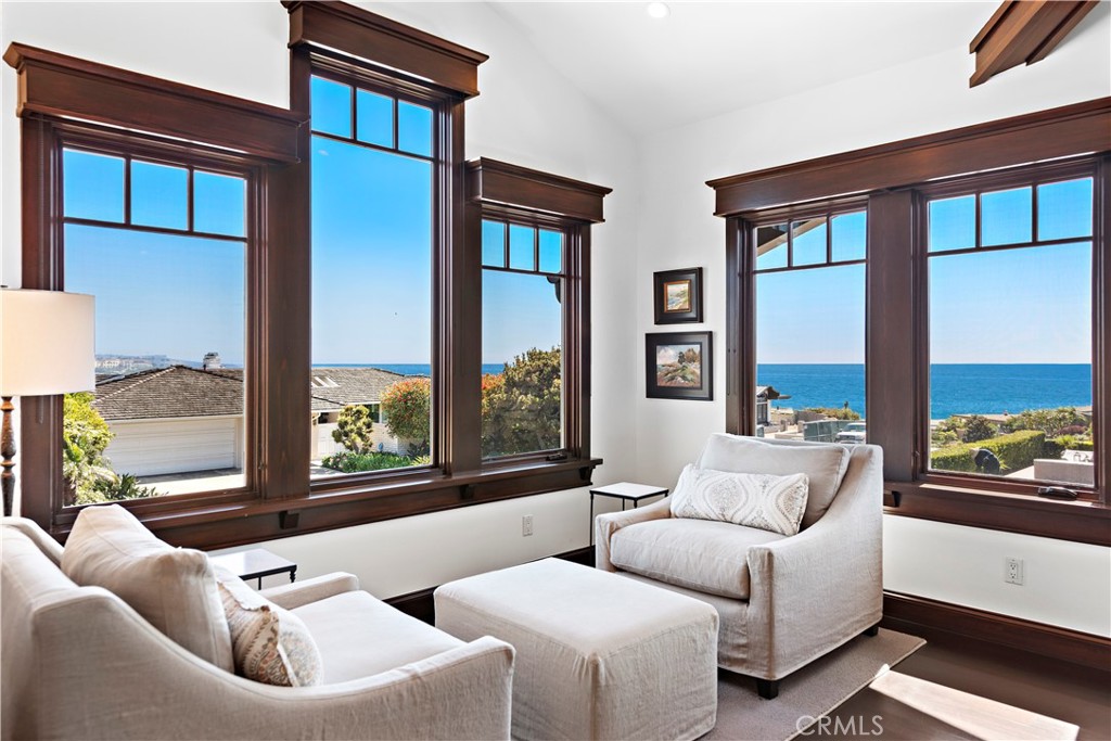 4 Monarch Bay Drive Dana Point, CA 92629 - Photo 11 of 34 a living room with furniture and a large window
