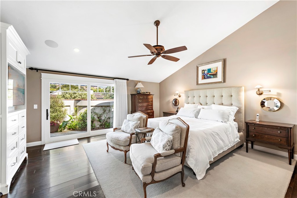 4 Monarch Bay Drive Dana Point, CA 92629 - Photo 15 of 34 a bedroom with a large bed and a large window