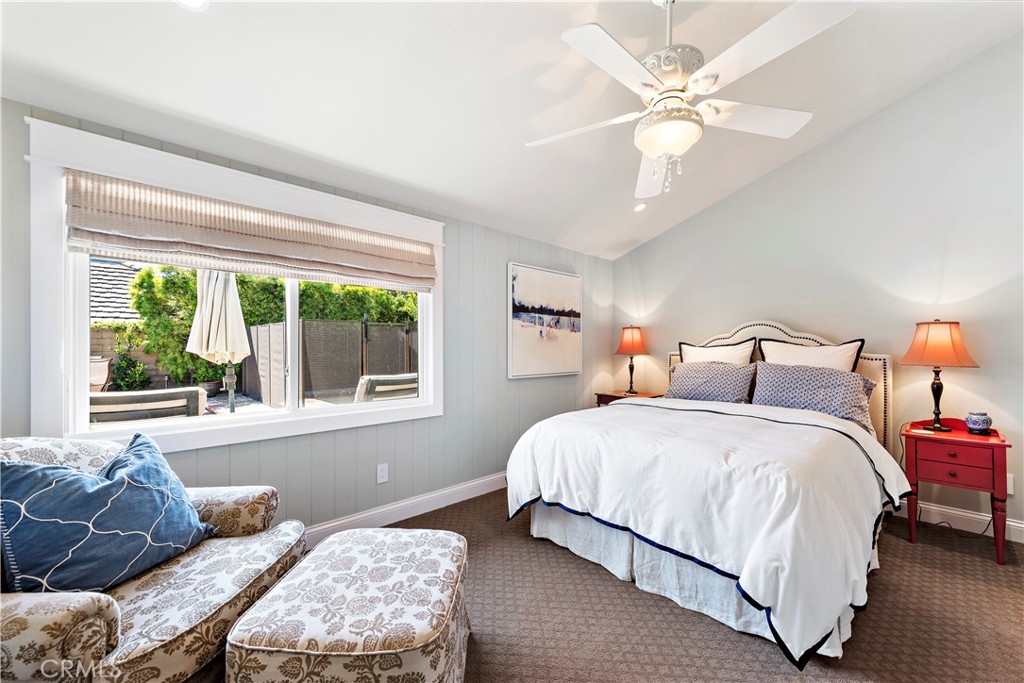 4 Monarch Bay Drive Dana Point, CA 92629 - Photo 21 of 34 a bedroom with a bed couch and window