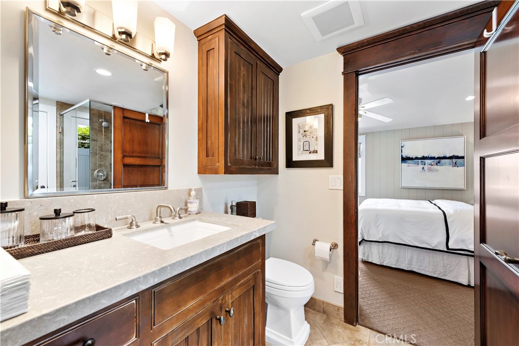 4 Monarch Bay Drive Dana Point, CA 92629 - Photo 22 of 34 a bathroom with a sink double vanity and a mirror